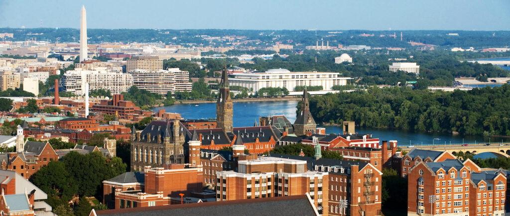 Aerial view of Georgetown with DC skyline in background